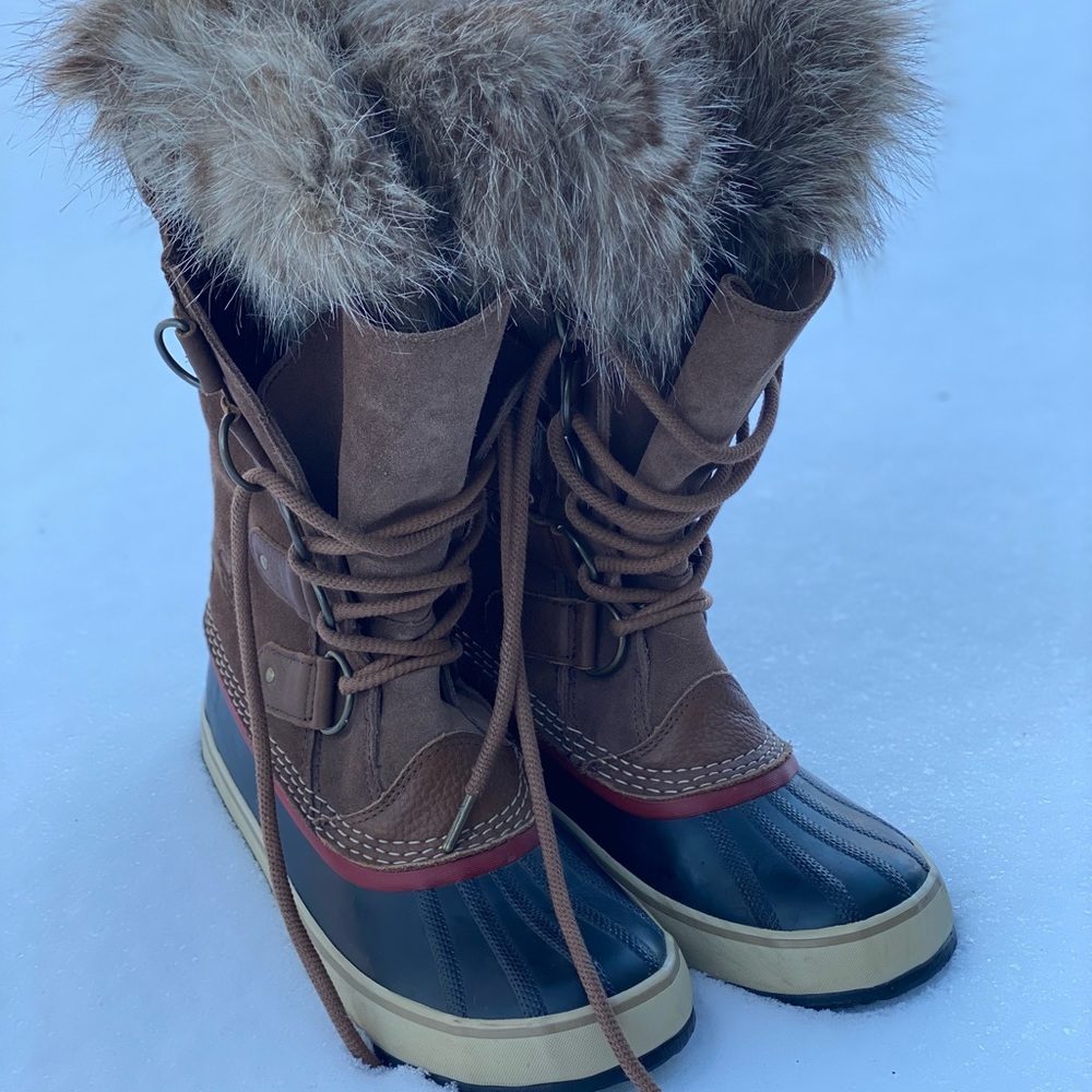 Sorel waterproof snow boots.  Faux and rubber bottoms. US size 9.
